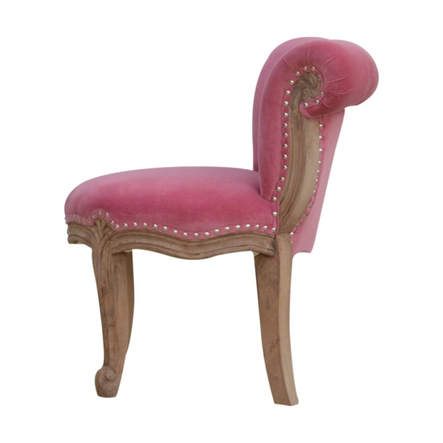 Chaise cloutée en velours rose