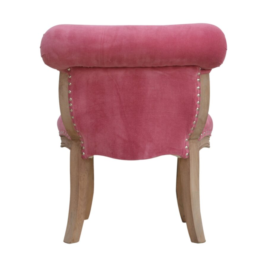 Chaise cloutée en velours rose