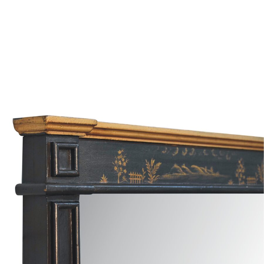 Détail d'angle du cadre peint en noir et or antique.