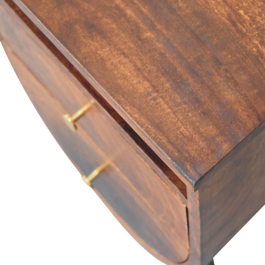 Wooden desk with brass handles.