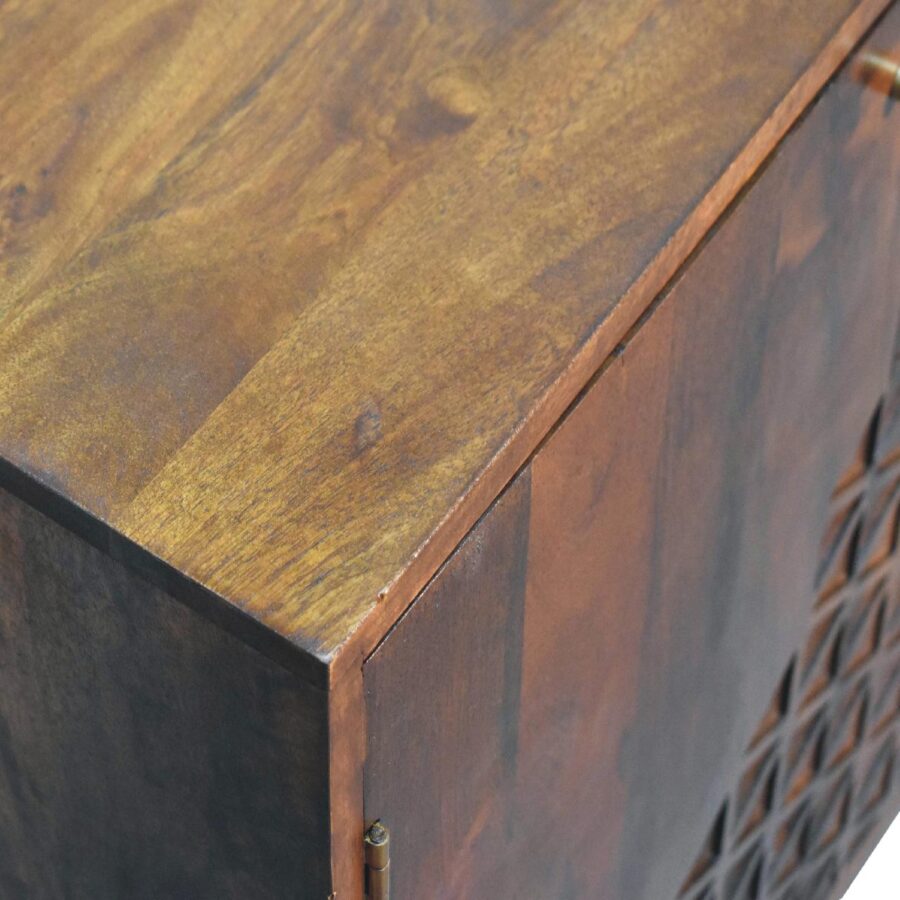 Close-up of wooden cabinet corner detail.