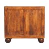 Wooden cabinet on round legs isolated on white.