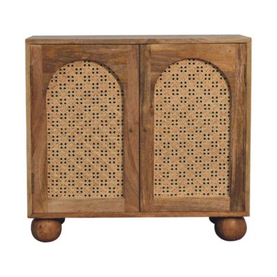 Wooden cabinet with rattan doors and spherical feet.