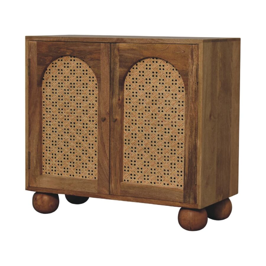 Wooden cabinet with cane webbing doors.