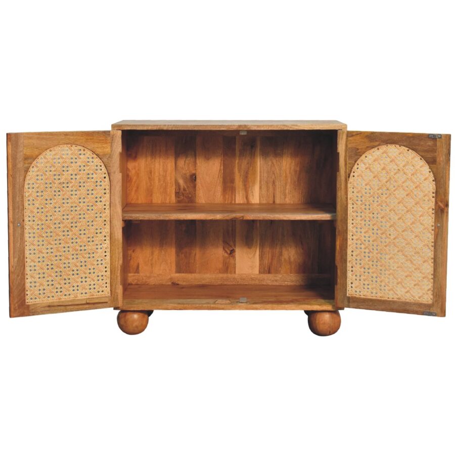 Wooden cabinet with cane doors open.