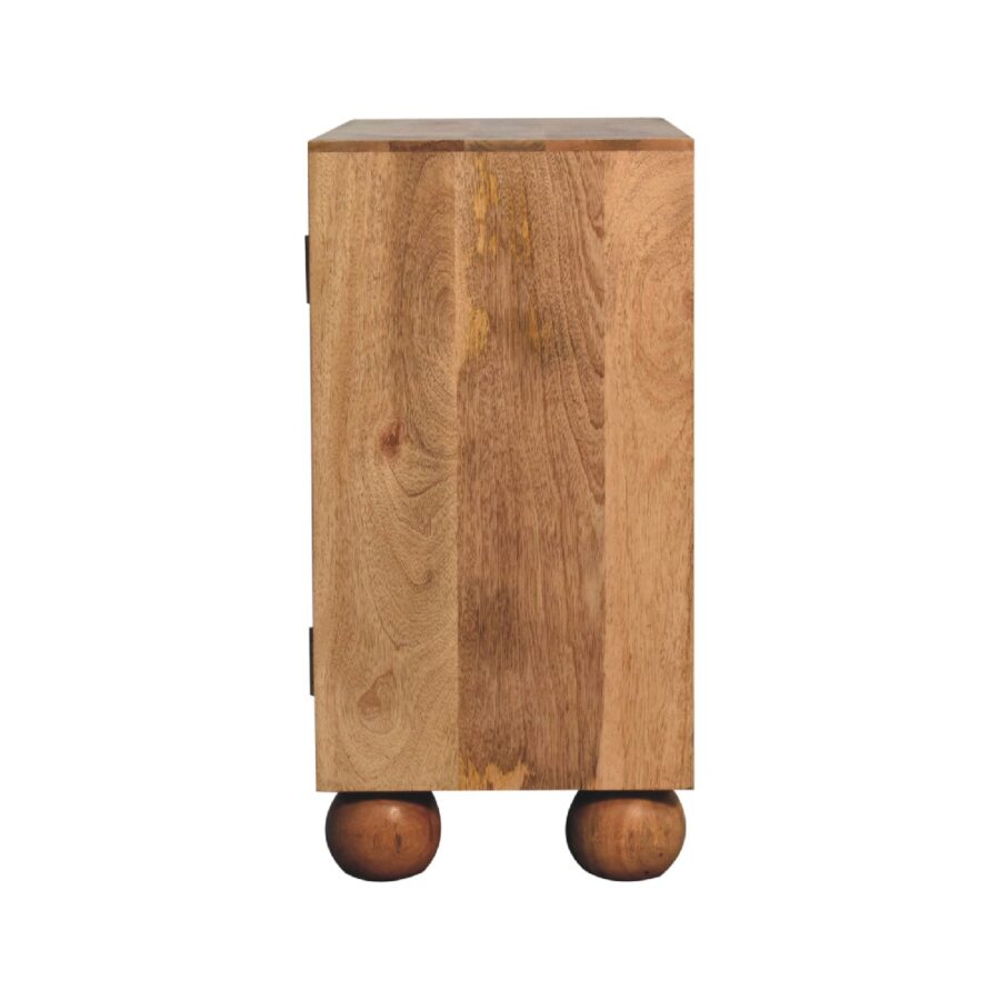Wooden cabinet on round legs.