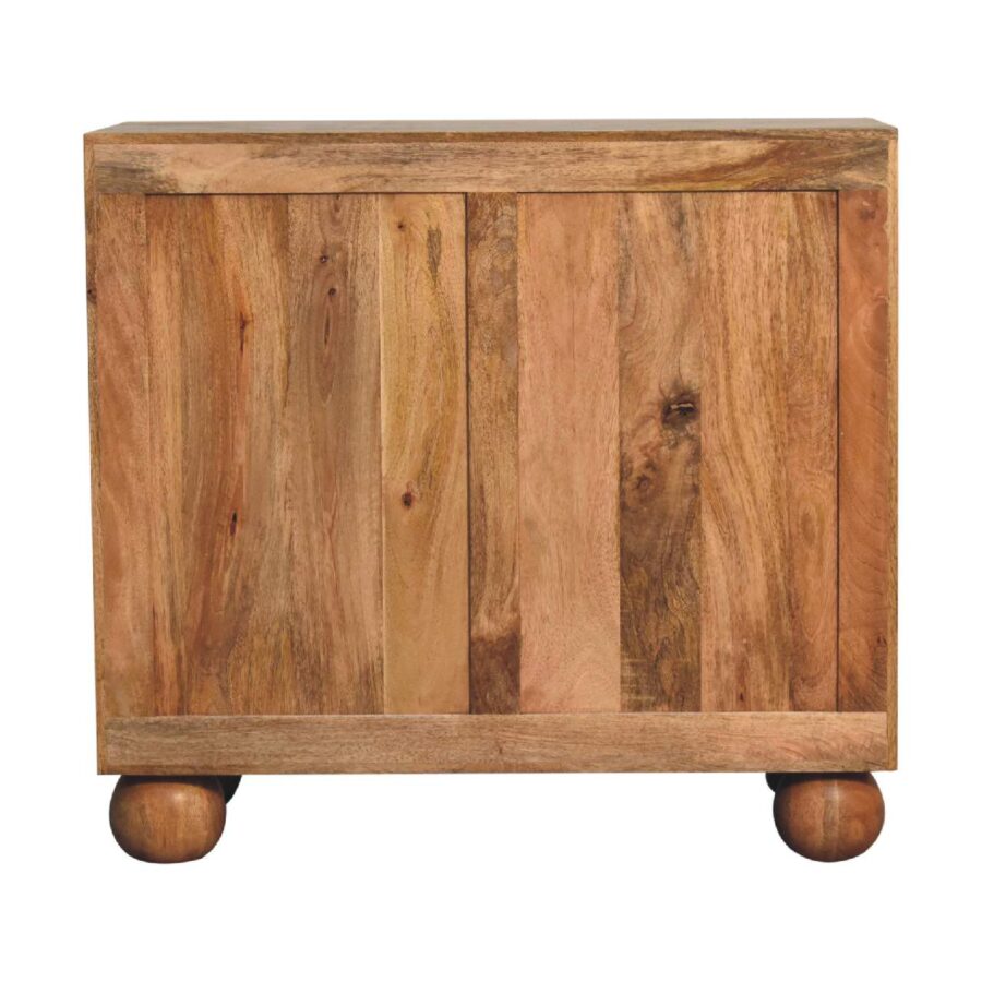 Wooden cabinet with spherical feet on white background.