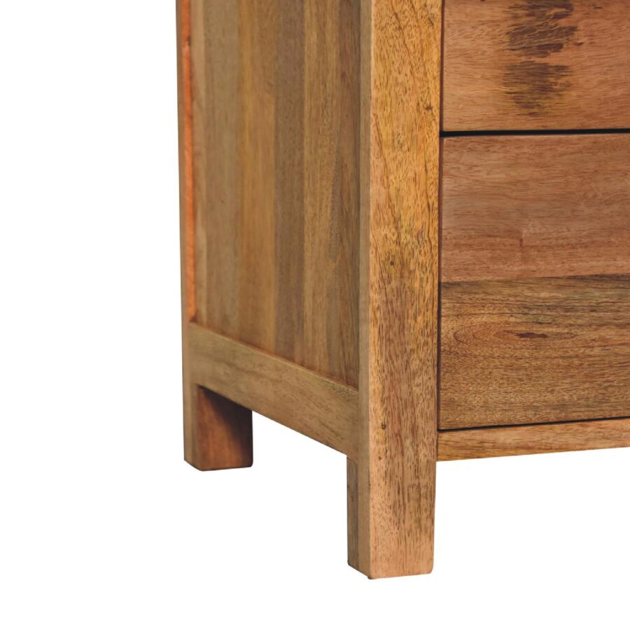 Wooden cabinet corner close-up.