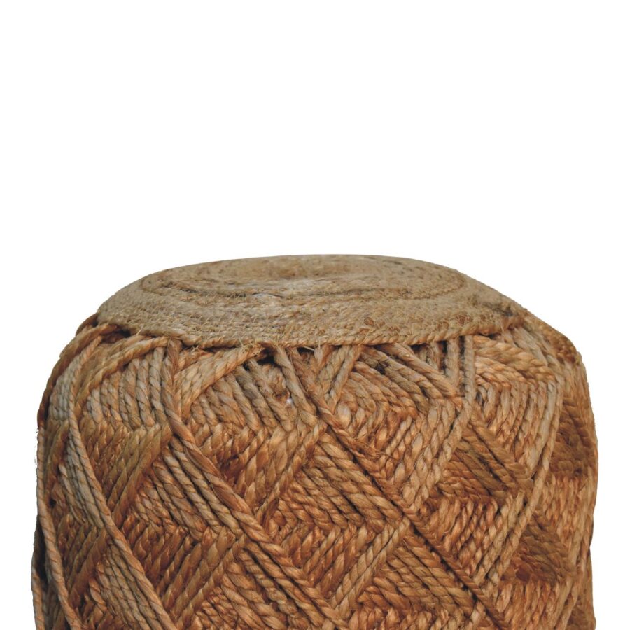 Woven jute pouffe on white background.