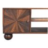 Wooden sideboard with radial patterned door.
