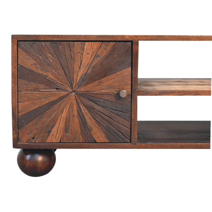 Wooden sideboard with radial patterned door.