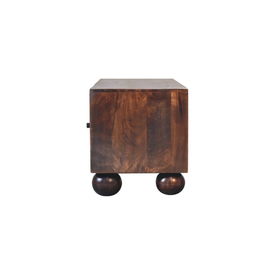Wooden cabinet on spherical feet isolated on white background.