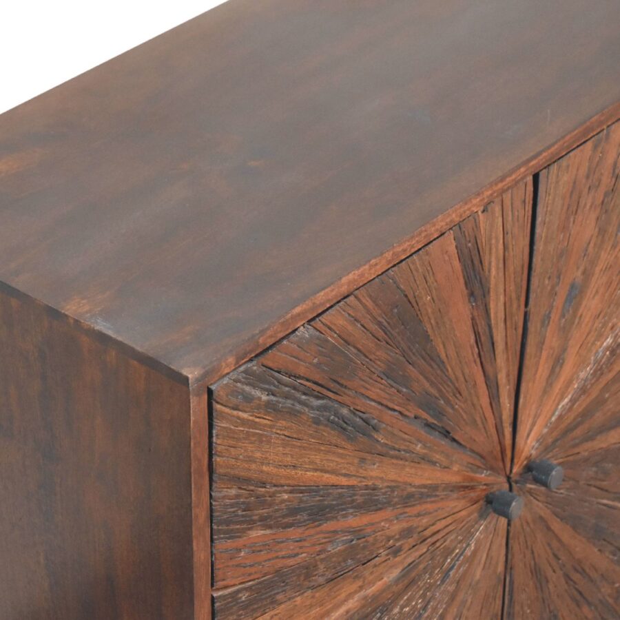 Wooden cabinet with radial patterned doors.