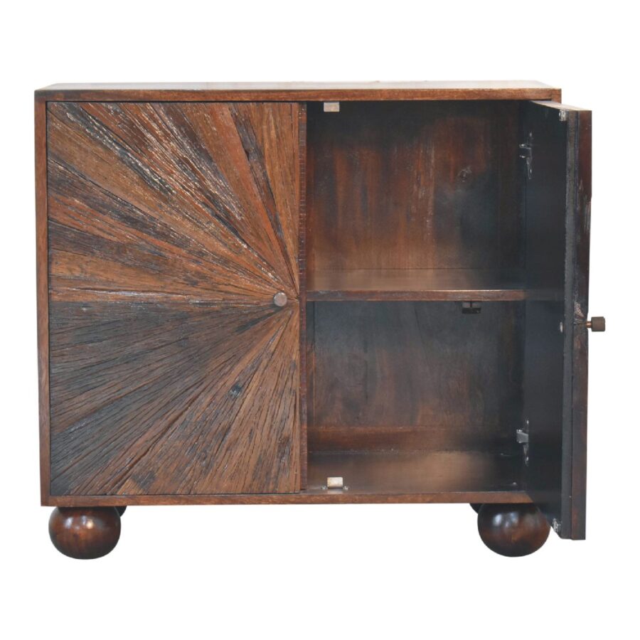 Wooden cabinet with sunburst pattern door open.