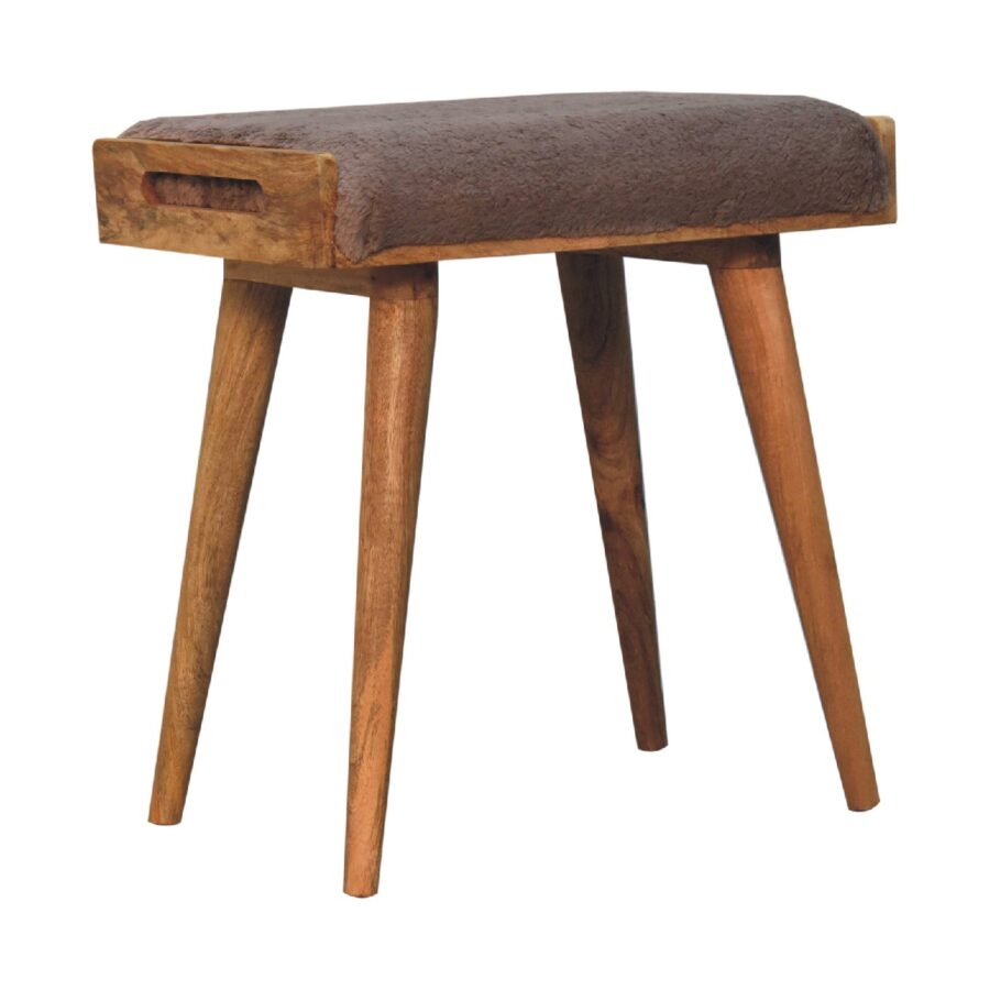 Wooden stool with upholstered brown top.