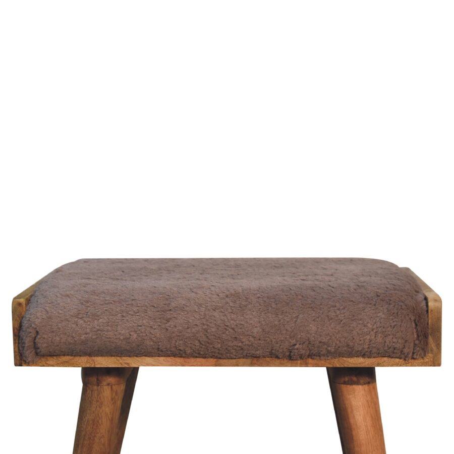 Wooden stool with brown upholstered top.