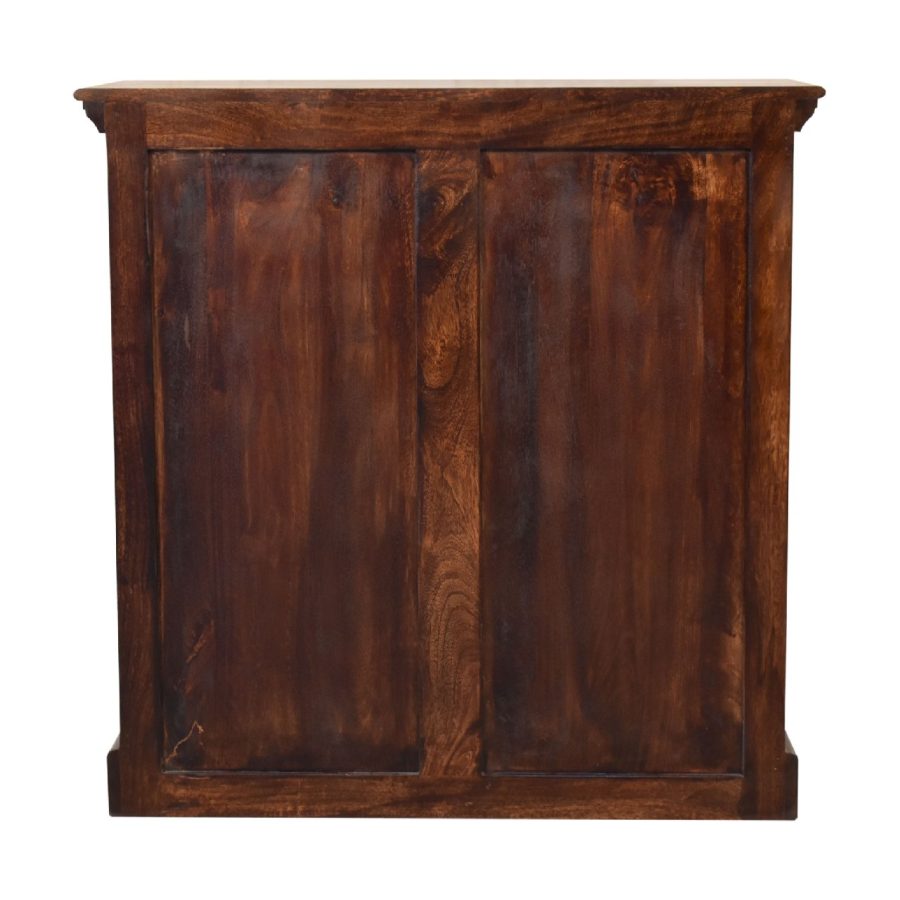 Wooden cabinet with closed doors on white background.
