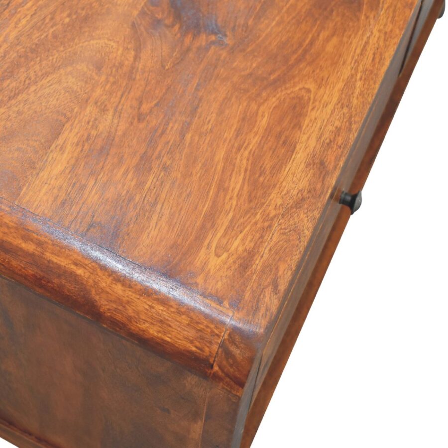 Corner of wooden table on white background.