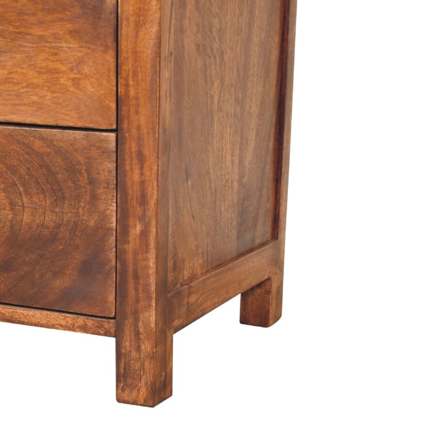 Wooden cabinet corner detail on white background.
