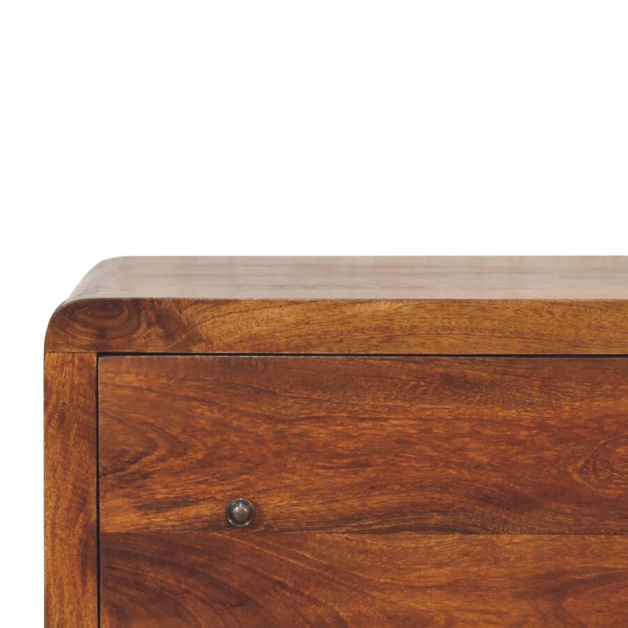 Wooden chest of drawers corner detail