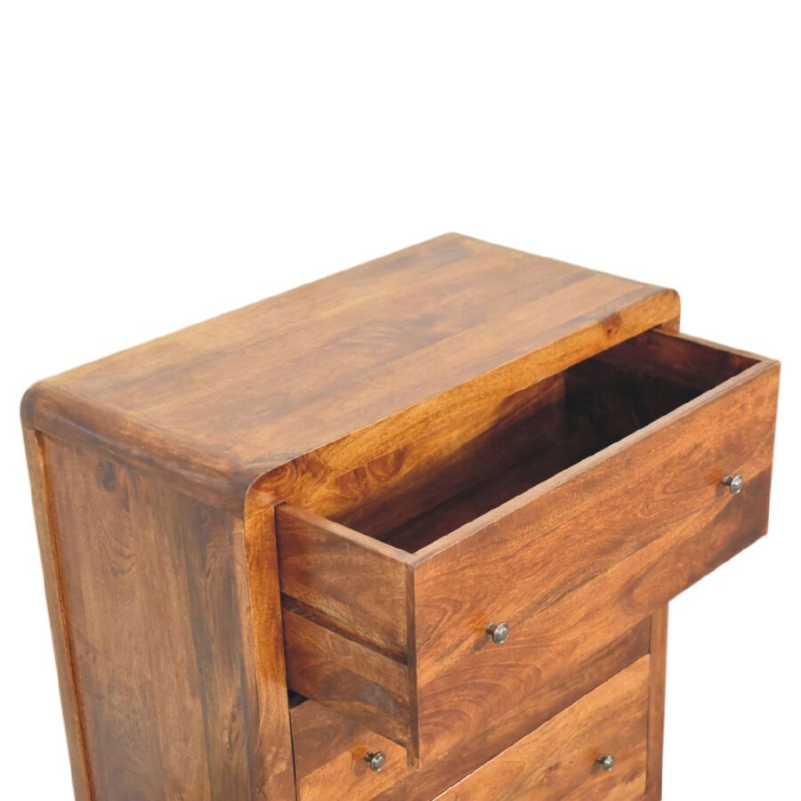 Wooden chest of drawers with open drawer.