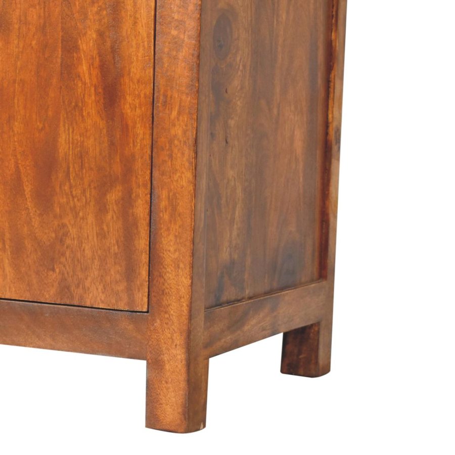 Wooden cabinet corner detail on white background.