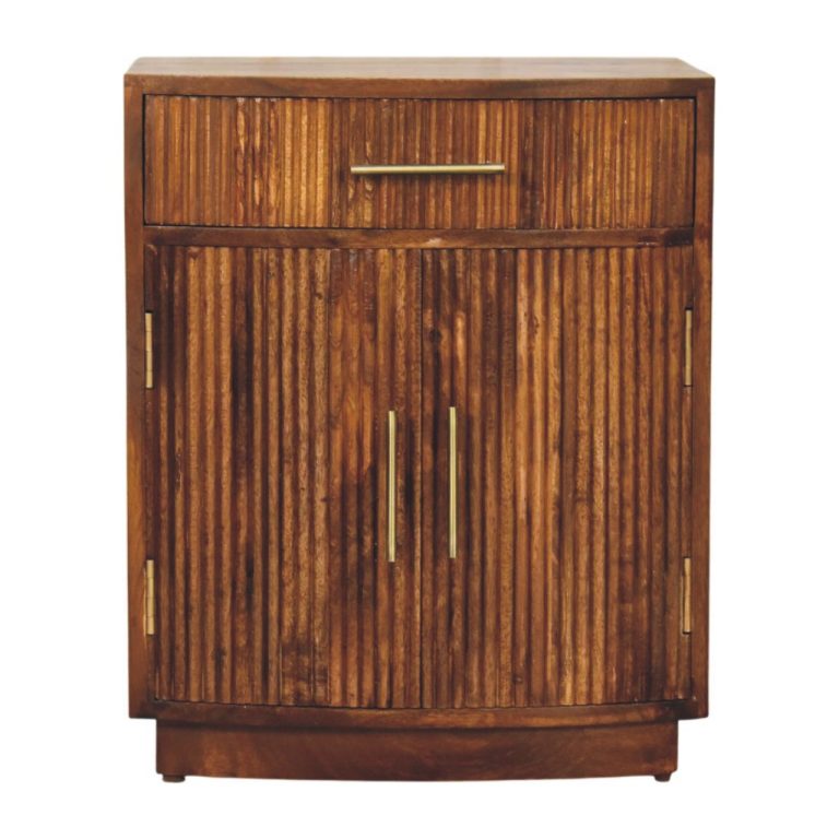 Wooden cabinet with ribbed doors and brass handles