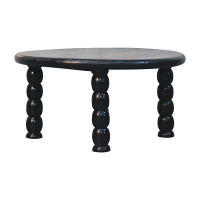 Round black wooden table with turned legs
