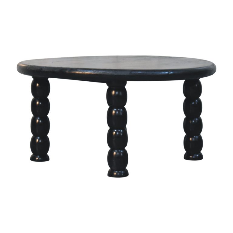 Round black wooden table with turned legs