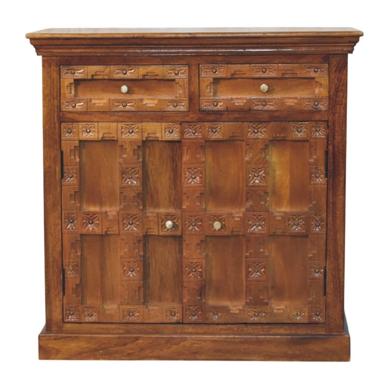 Carved wooden cabinet with panelled doors and drawers